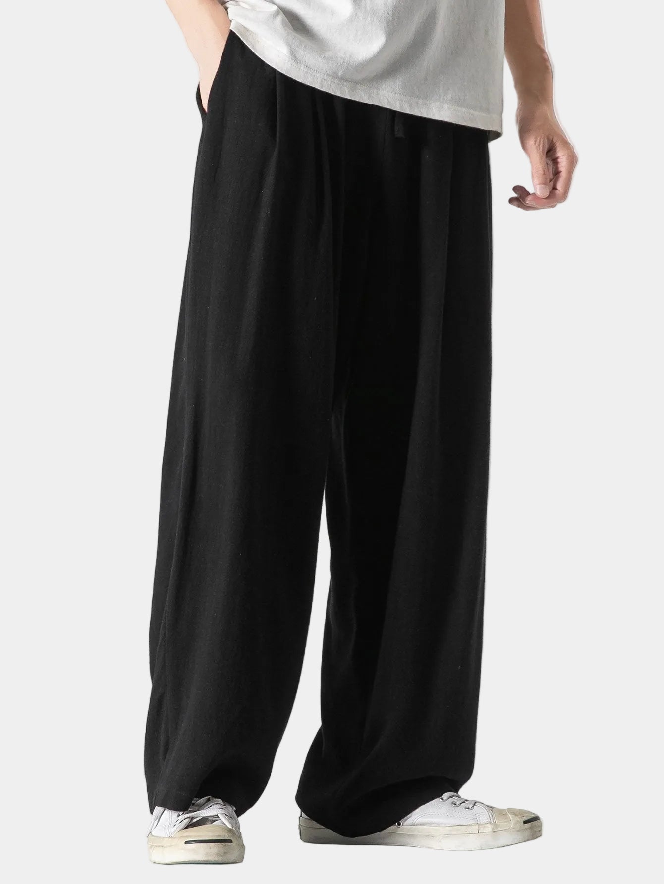 Men's trousers with a wide cut, elasticated waistband and drawstring 1