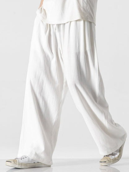 Men's trousers with a wide cut, elasticated waistband and drawstring 6