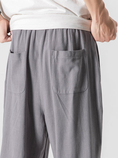 Men's trousers with a wide cut, elasticated waistband and drawstring 8